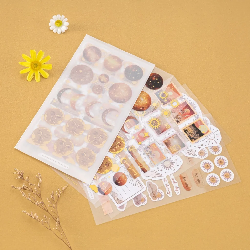 Transparent vellum sticker sheets with aesthetic celestial illustrations for custom art journaling and crafts.