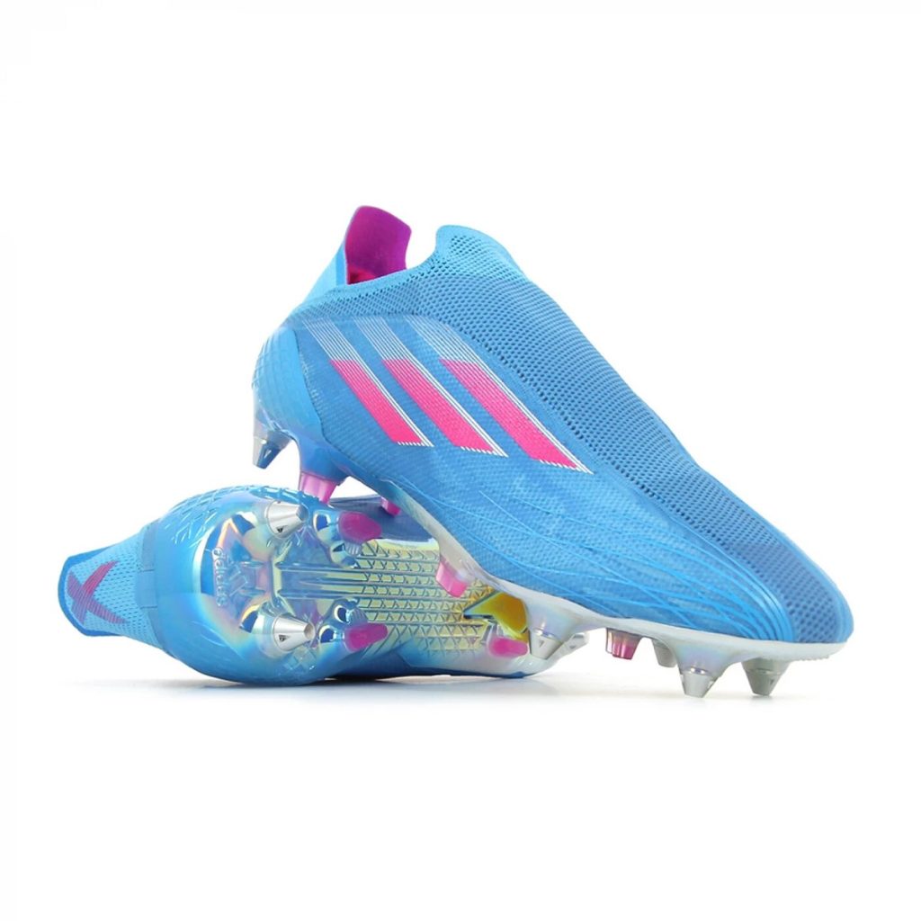 Sky blue Adidas X Speedflow boots with iridescent pink accents and long metal studs for soft ground.