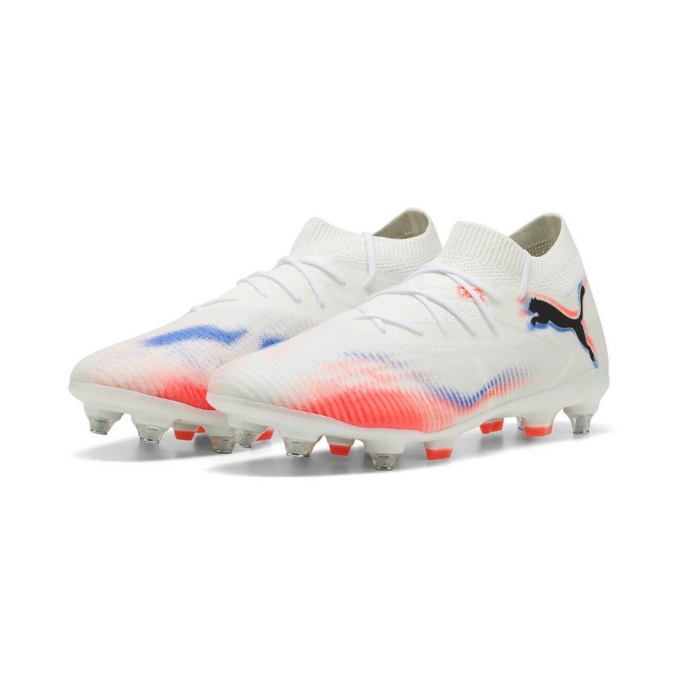 Lightweight white Puma boots showing the specialized stud layout for agility on firm ground.